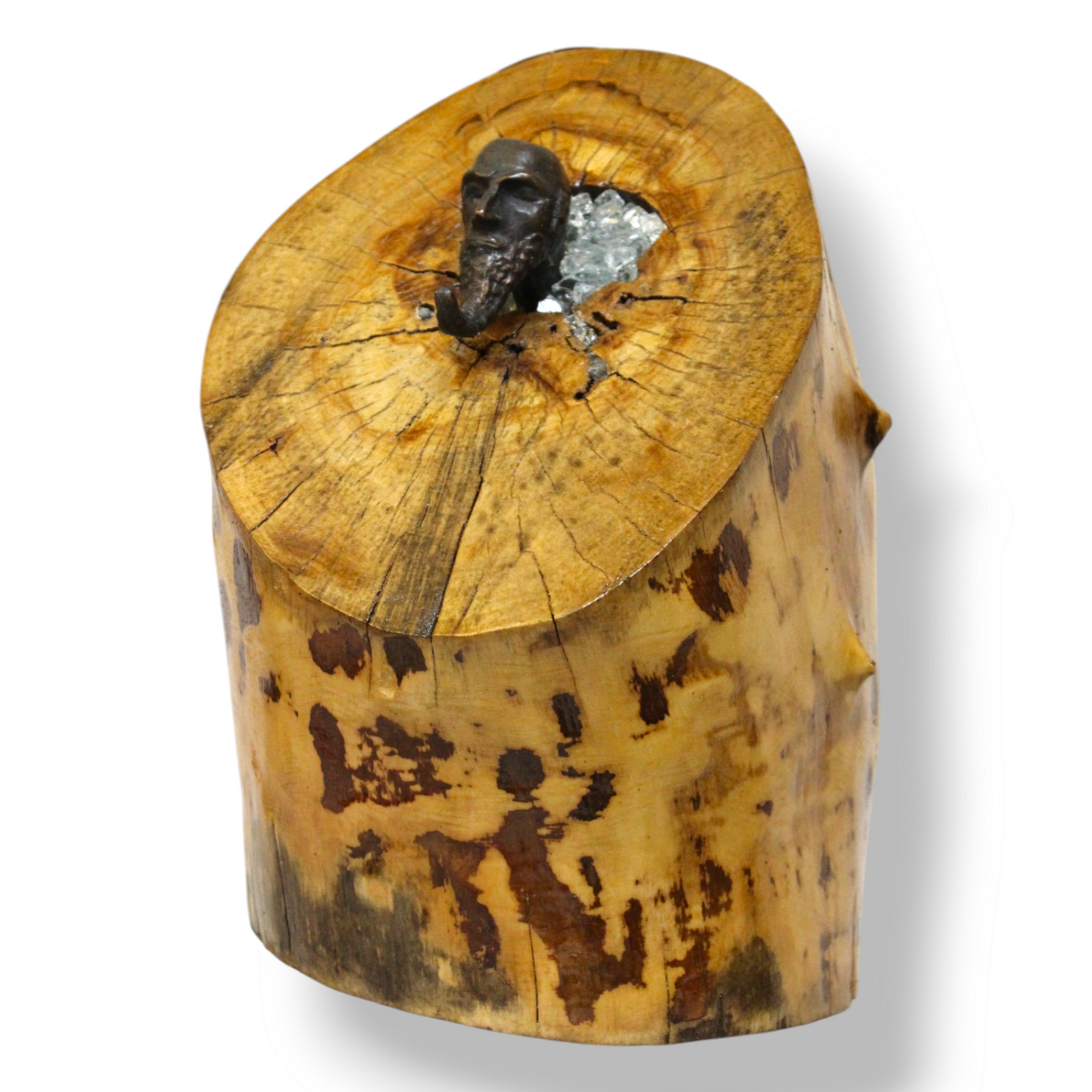 Old Sage - A metallic old figurine rests in shattered glass