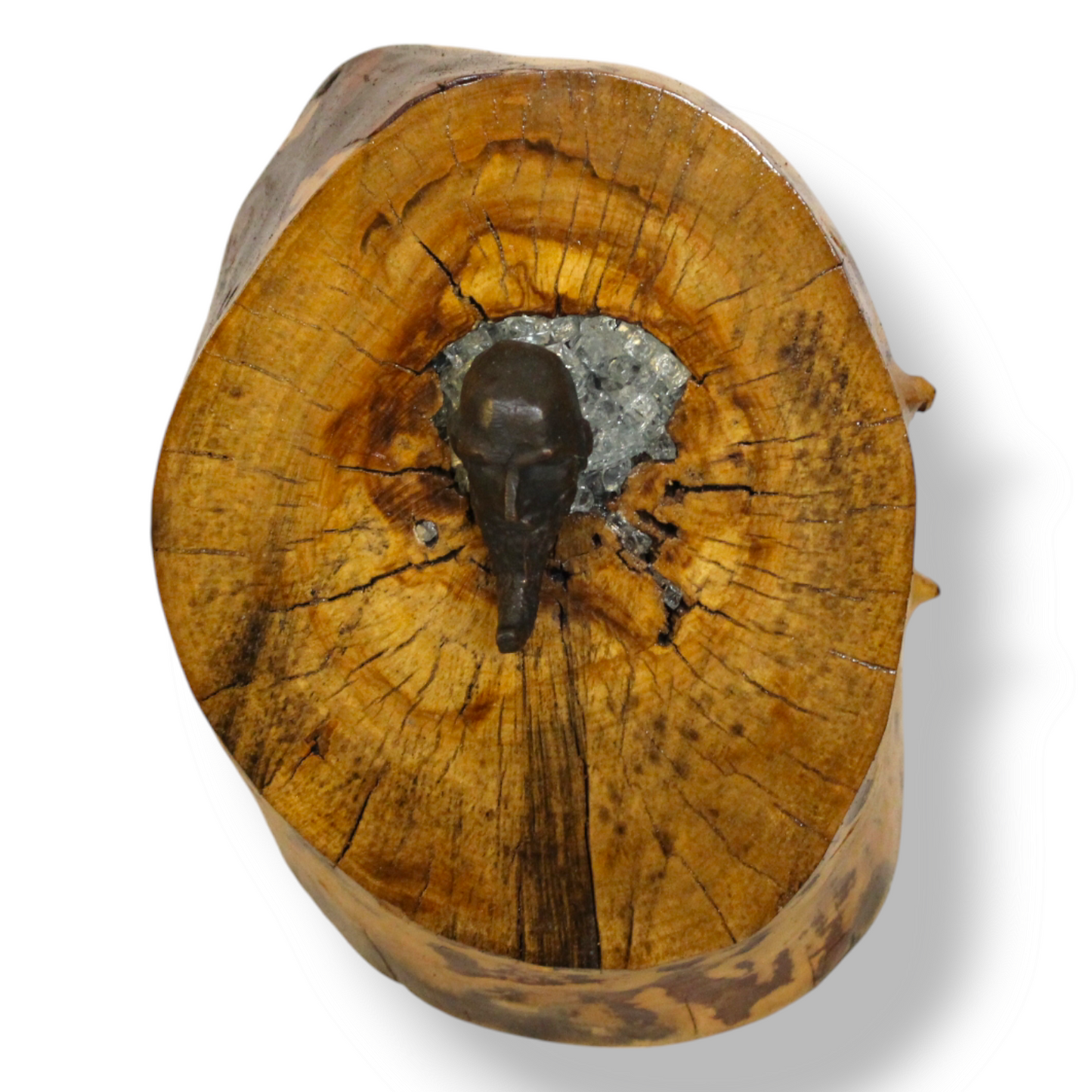 Old Sage - A metallic old figurine rests in shattered glass