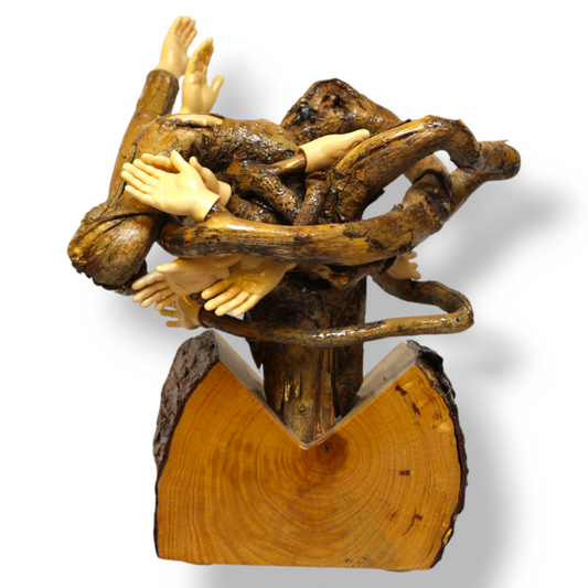 Ambidextrous”- A multi- branched wooden statue