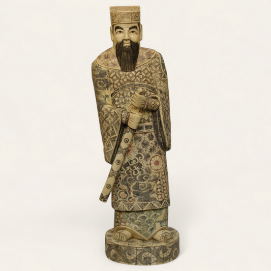 Standing Elder Chinese man with sword bone relief statue